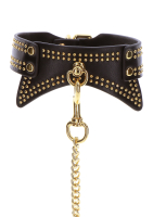 Collana con rivetti e guinzaglio a catena in similpelle nero-oro regolabile con fibbia e catena con passante per mano.